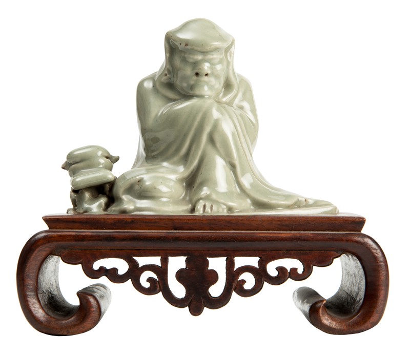 Dignitary kneeling on one leg. Celadon figurine.  - Auction ASIAN AND CONTINENTAL  [..]