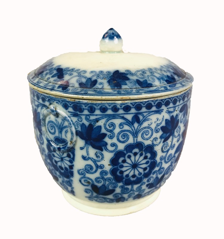 A Chinese Blue and White Pot with Lip decorated with Floral and Vegetable Motives.  [..]