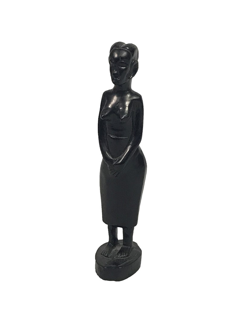 African figurine in glossy patinated ebony depicting a woman with abundant breasts.  [..]